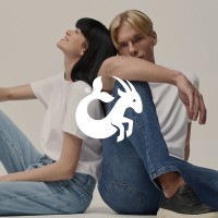 Capricórnio Têxtil logo